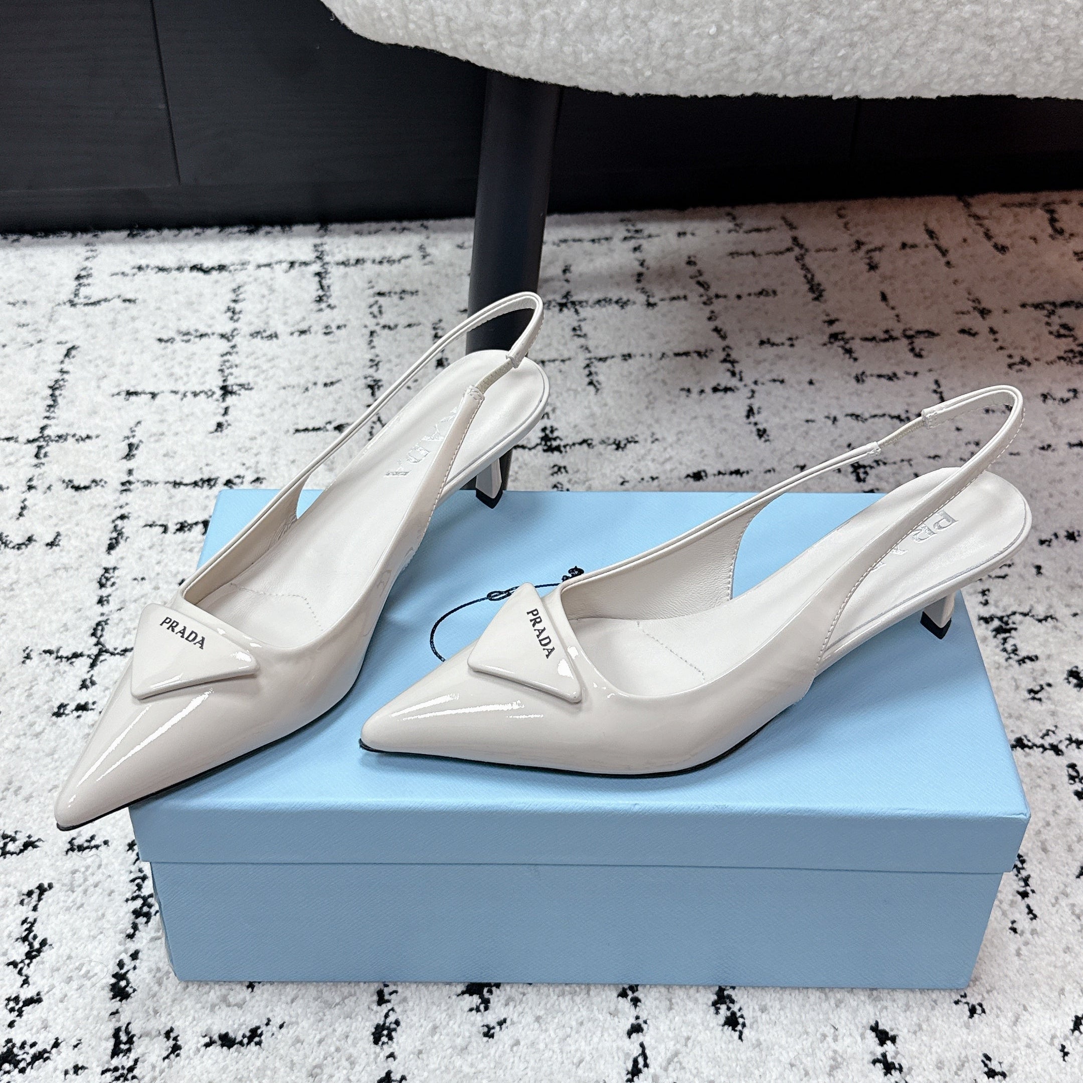 PRADA 26S SLINGBACK PUMPS 60MM IN CREAM WHITE PATENT CALFSKIN
