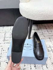 PRADA 26S LOAFERS 25MM IN BLACK CALFSKIN