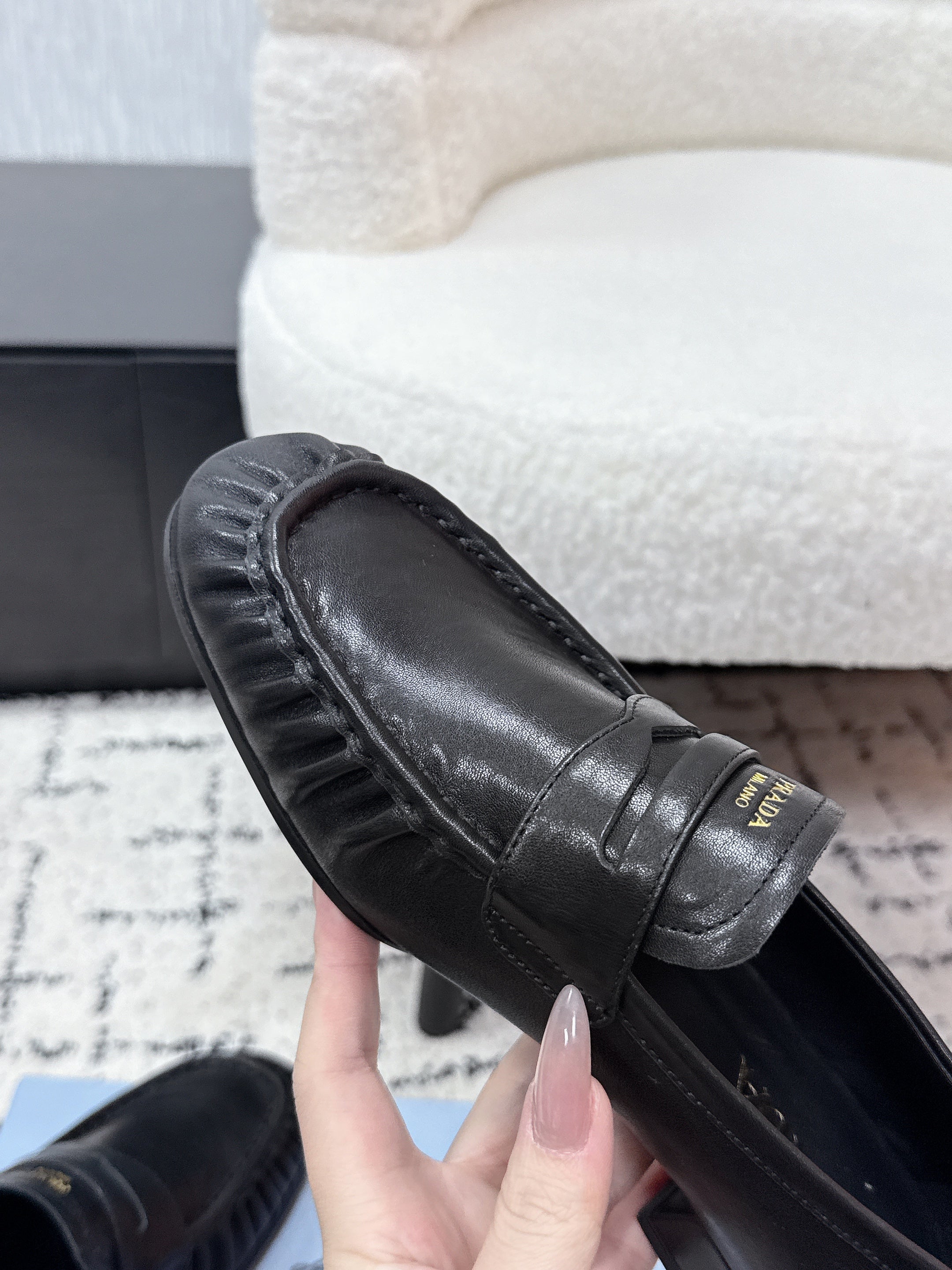 PRADA 26S LOAFERS 25MM IN BLACK CALFSKIN