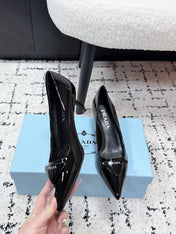 PRADA 26S POINTED-TOE HIGH HEELS 60MM IN BLACK PATENT CALFSKIN WITH LOGO