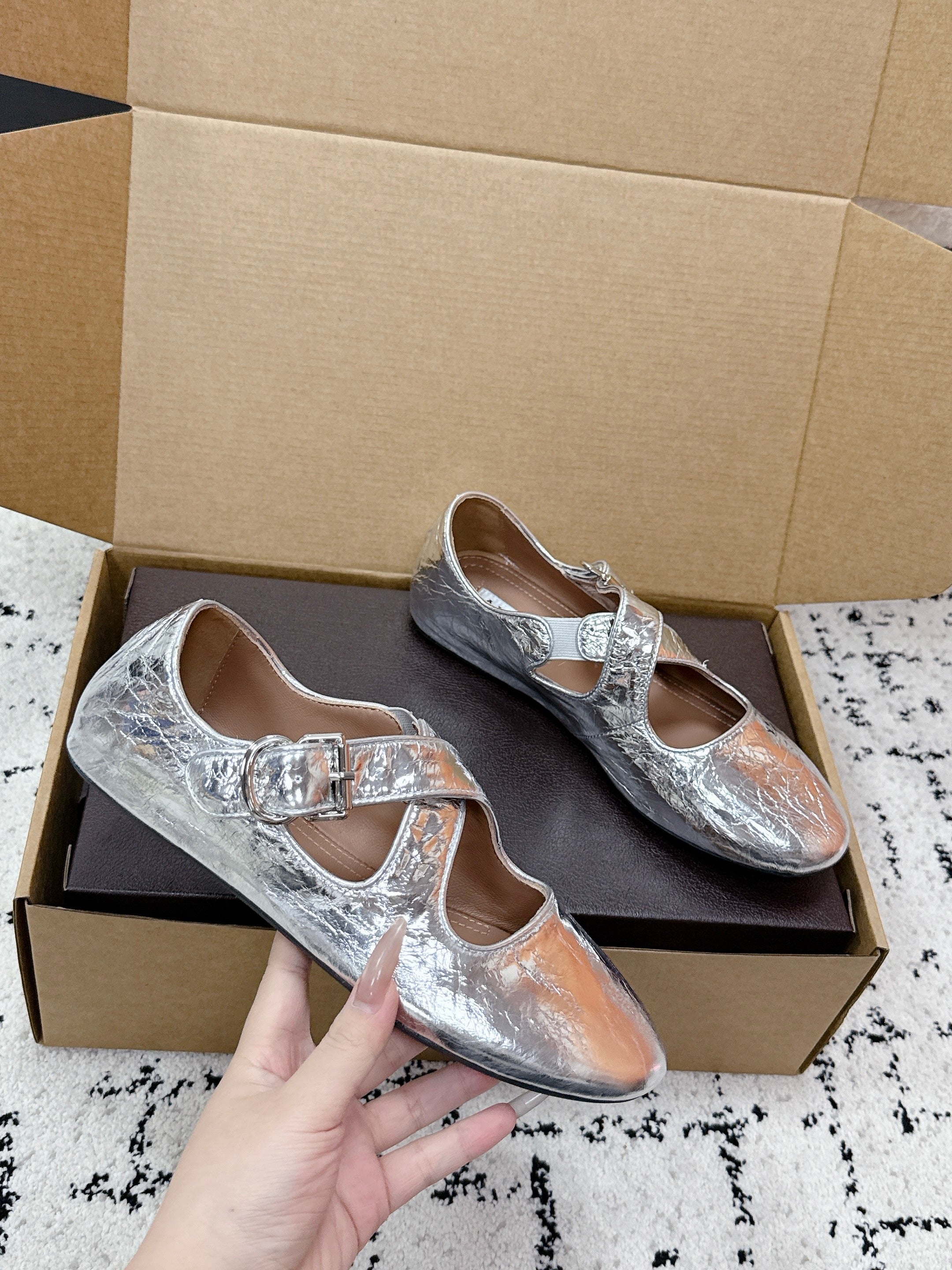 ALAIA 26S CROSS-STRAP BALLET FLATS IN SILVER LAMBSKIN
