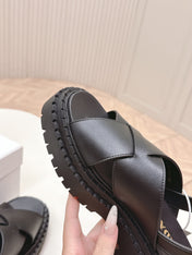PRADA 25S CRISSCROSS SANDALS IN BLACK CALFSKIN