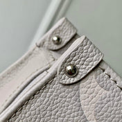 ONTHEGO EAST WEST BAG 25 IN BICOLOR MONOGRAM EMPREINTE LEATHER