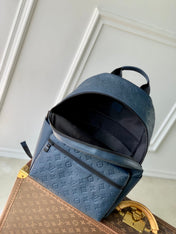 DISCOVERY PM BACKPACK 38 IN NAVY BLUE LAMBSKIN EMBOSSED MONOGRAM LOGO