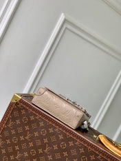 STEAMER WEARABLE WALLET 18 IN LIGHT BROWN MONOGRAM TAURILLON CALFSKIN