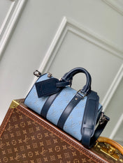 KEEPALL BANDOULIÈRE 25 INSKY BLUE MONOGRAM HERITAGE CANVAS DARK BLUE CALFSKIN