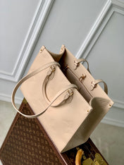 ONTHEGO MM 35 IN  BLUSH PINK MONOGRAM CALFSKIN