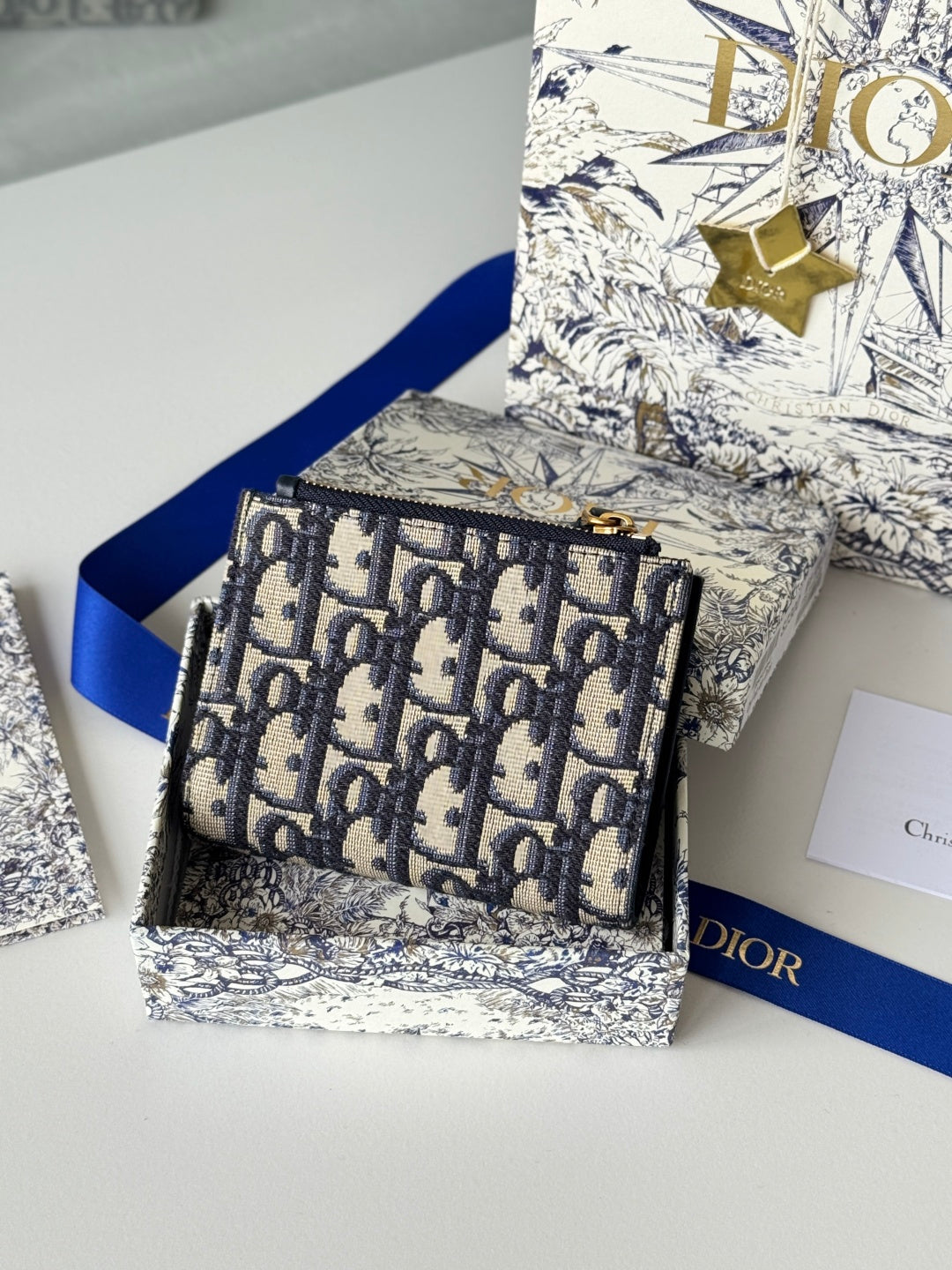 DIOR 25S 30 MONTAIGNE DAHLIA WALLET 11 IN BLUE DIOR OBLIQUE JACQUARD
