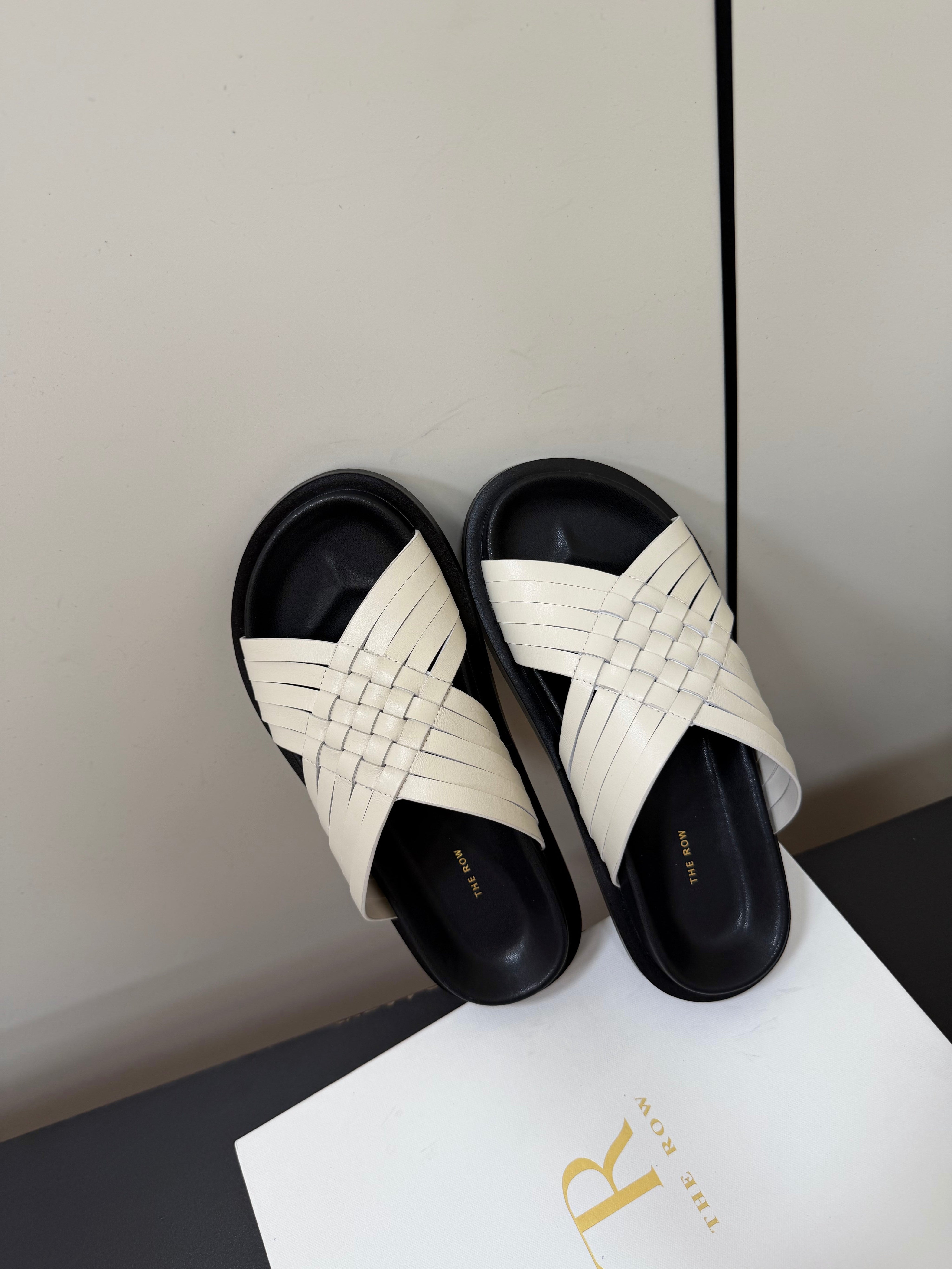 THE ROW 26S CROSS STRAP SANDALS IN IVORY WHITE CALFSKIN