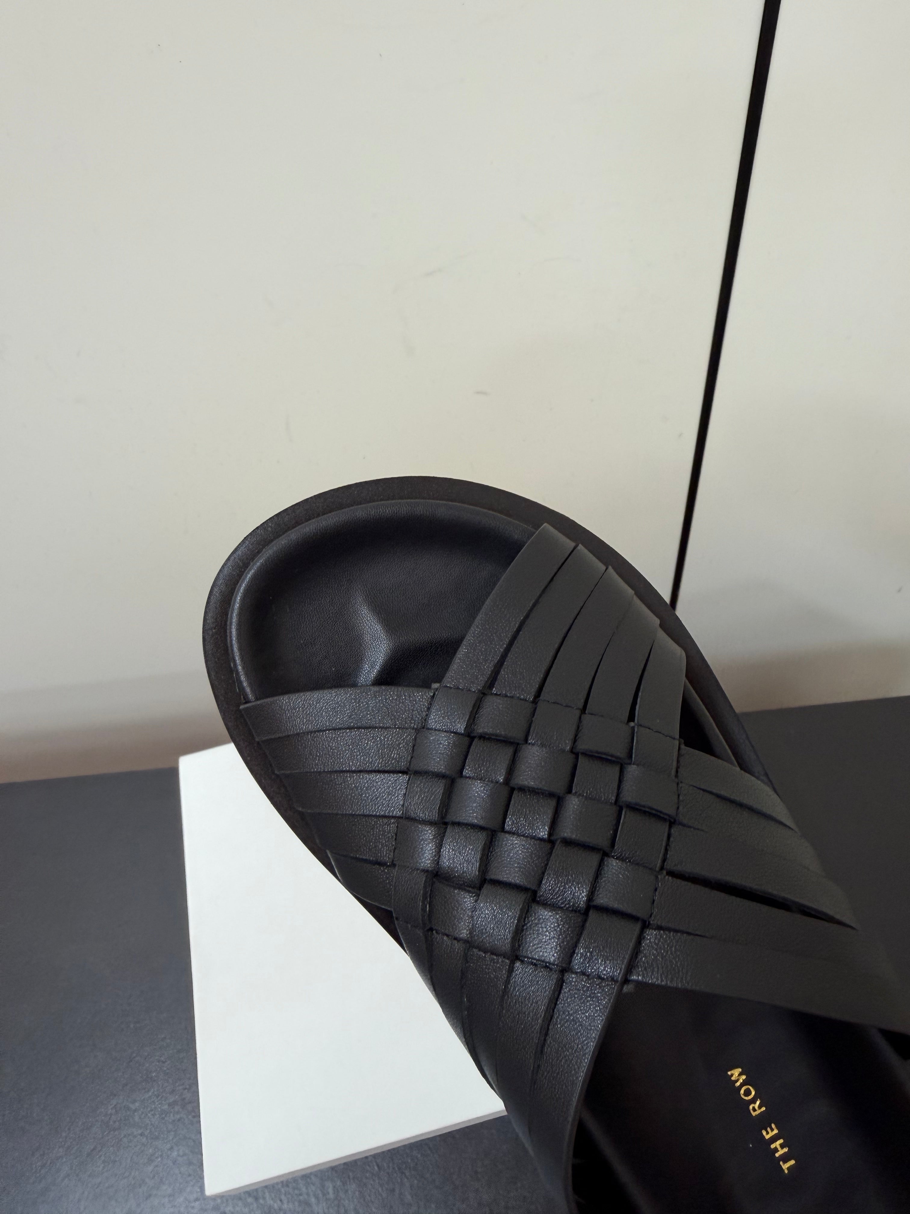 THE ROW 26S CROSS STRAP SANDALS IN BLACK CALFSKIN