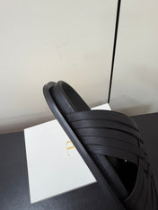 THE ROW 26S CROSS STRAP SANDALS IN BLACK CALFSKIN