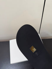 THE ROW 26S CROSS STRAP SANDALS IN BLACK CALFSKIN