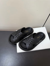 THE ROW 26S CROSS STRAP SANDALS IN BLACK CALFSKIN