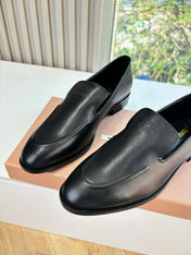 MIUMIU 26S LOAFERS IN BLACK LAMBSKIN