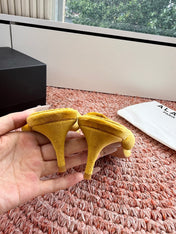 ALAIA 26S HEELED THONG SANDALS IN MUSTARD YELLOW VELVET