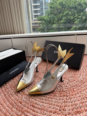 CHANEL 26S POINTED TOE HIGH HEEL SLINGBACKS IN GOLD AND SILVER LAMBSKIN WITH FLORAL APPLIQUE