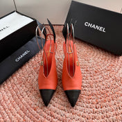 CHANEL 26S POINTED TOE HIGH HEEL SLINGBACKS IN ORANGE LAMBSKIN WITH BLACK FLORAL APPLIQUE