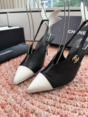 CHANEL 26S POINTED TOE HIGH HEEL SLINGBACKS IN BLACK AND WHITE LAMBSKIN WITH FLORAL APPLIQUE