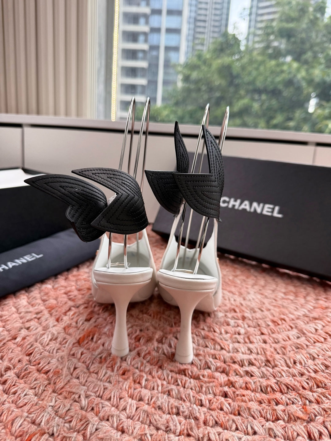 CHANEL 26S POINTED TOE HIGH HEEL SLINGBACKS IN WHITE LAMBSKIN WITH BLACK FLORAL APPLIQUE