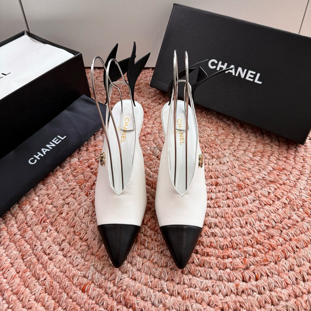 CHANEL 26S POINTED TOE HIGH HEEL SLINGBACKS IN WHITE LAMBSKIN WITH BLACK FLORAL APPLIQUE