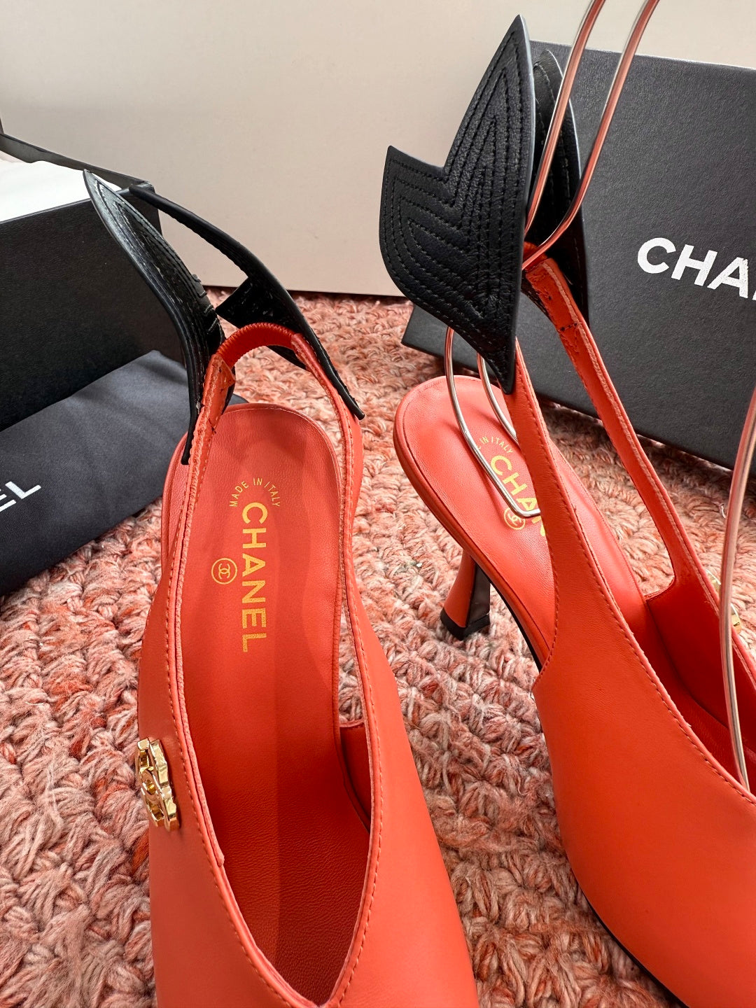 CHANEL 26S POINTED TOE HIGH HEEL SLINGBACKS IN ORANGE LAMBSKIN WITH BLACK FLORAL APPLIQUE