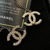 CHANEL 26S DOUBLE C LOGO PEARL PAVE DROP CHAIN EARRINGS IN GOLD METAL 631010