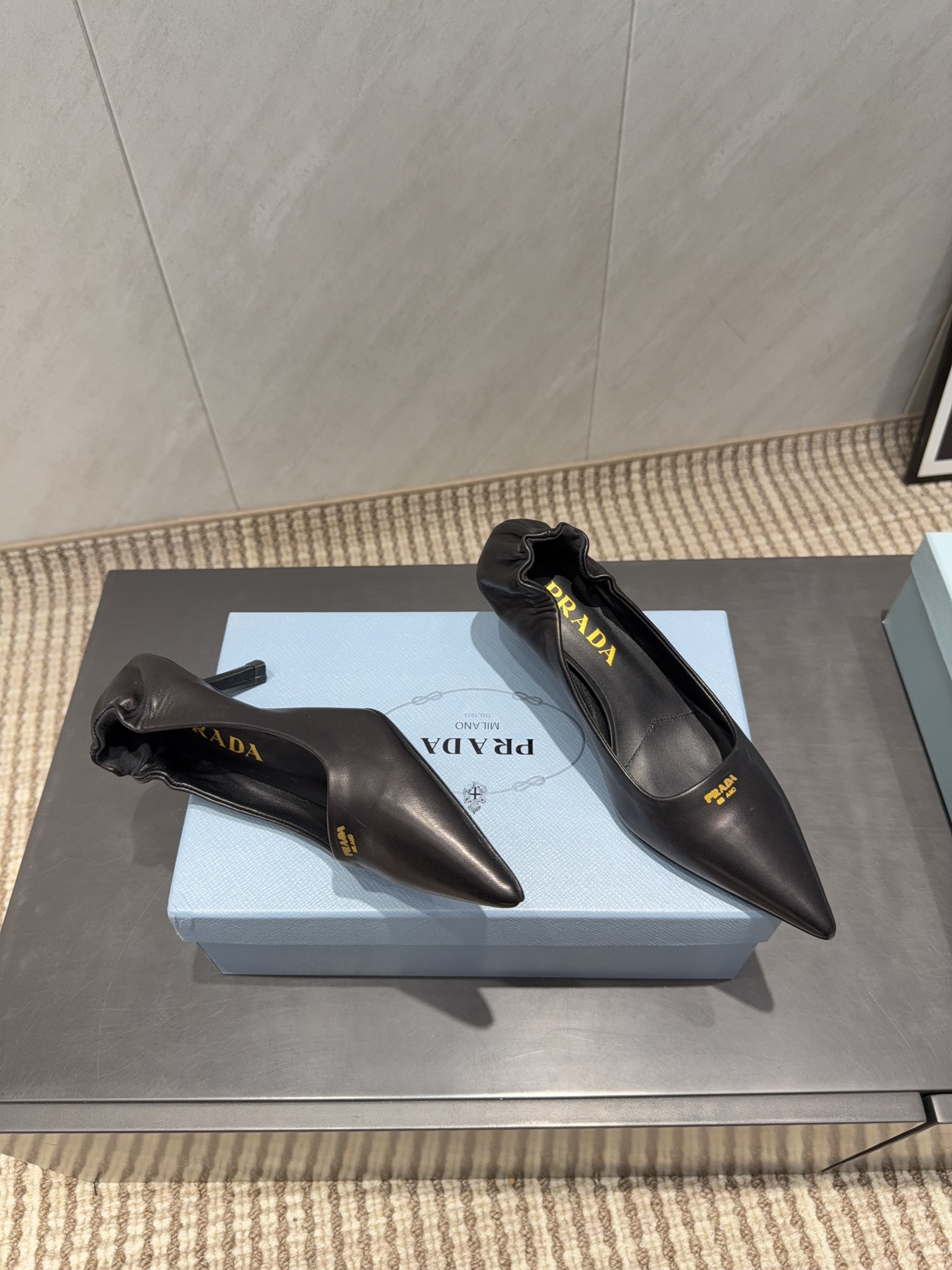 PRADA 26S POINTED TOE PUMPS 55MM IN BLACK SHEEPSKIN
