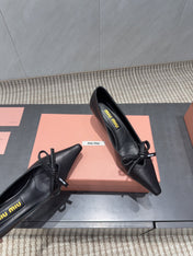 MIUMIU 26S POINTED TOE PUMPS 55MM IN BLACK CALFSKIN WITH BOW