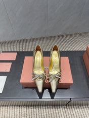 MIUMIU 26S POINTED TOE PUMPS 55MM IN GOLD CALFSKIN WITH BOW