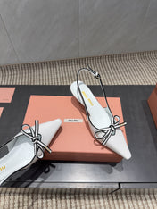 MIUMIU 26S SLINGBACK 55MM IN WHITE AND BLACK CALFSKIN WITH BOW