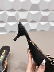 PRADA 26S POINTED TOE LACE TRIM MULES 55MM IN BLACK CALFSKIN WITH BOW