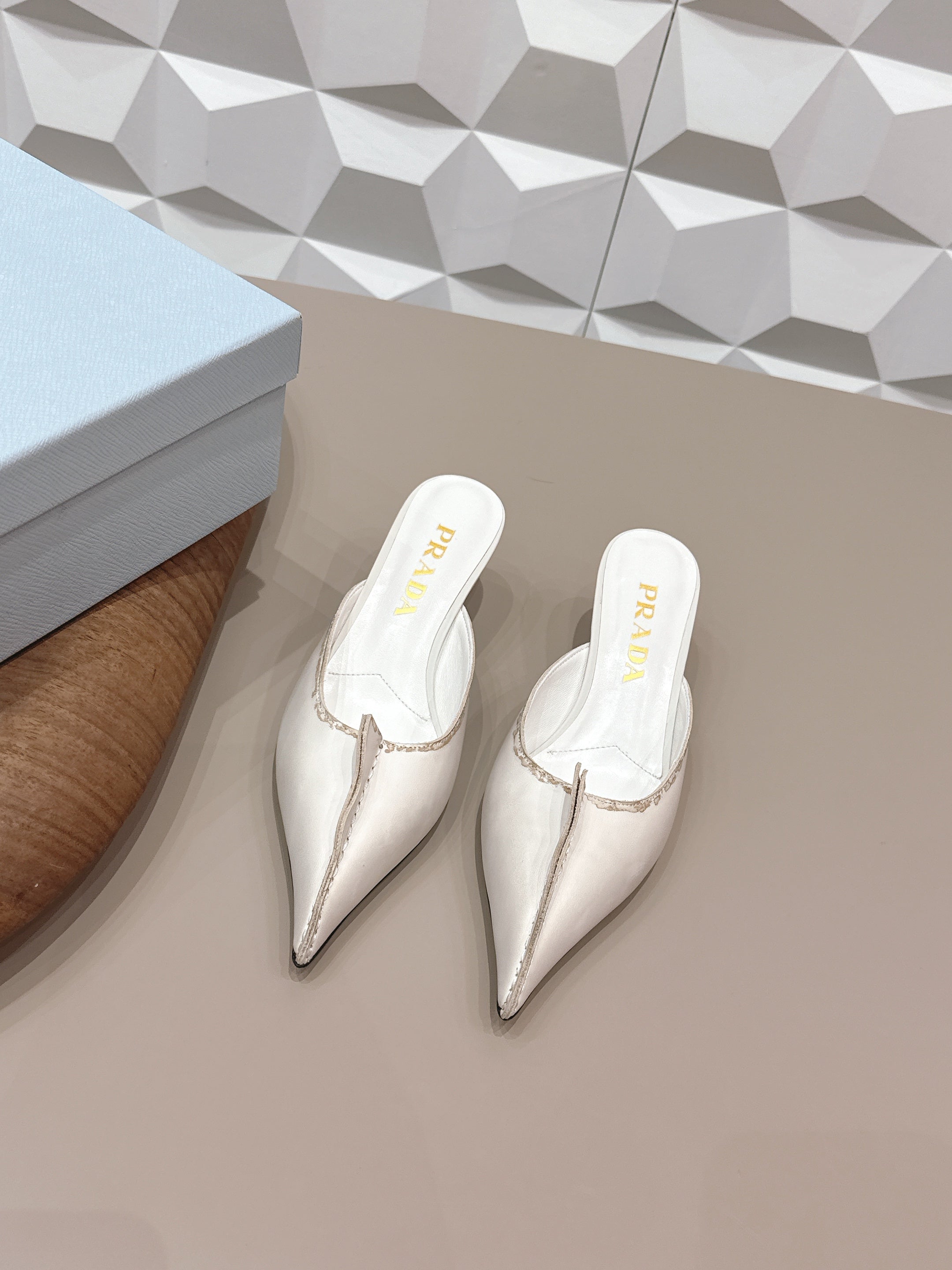 PRADA 26S POINTED TOE LACE TRIM MULES 55MM IN CREAM WHITE CALFSKIN