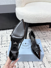 PRADA 26S POINTED-TOE HIGH HEELS 75MM IN BLACK PATENT CALFSKIN WITH BOW