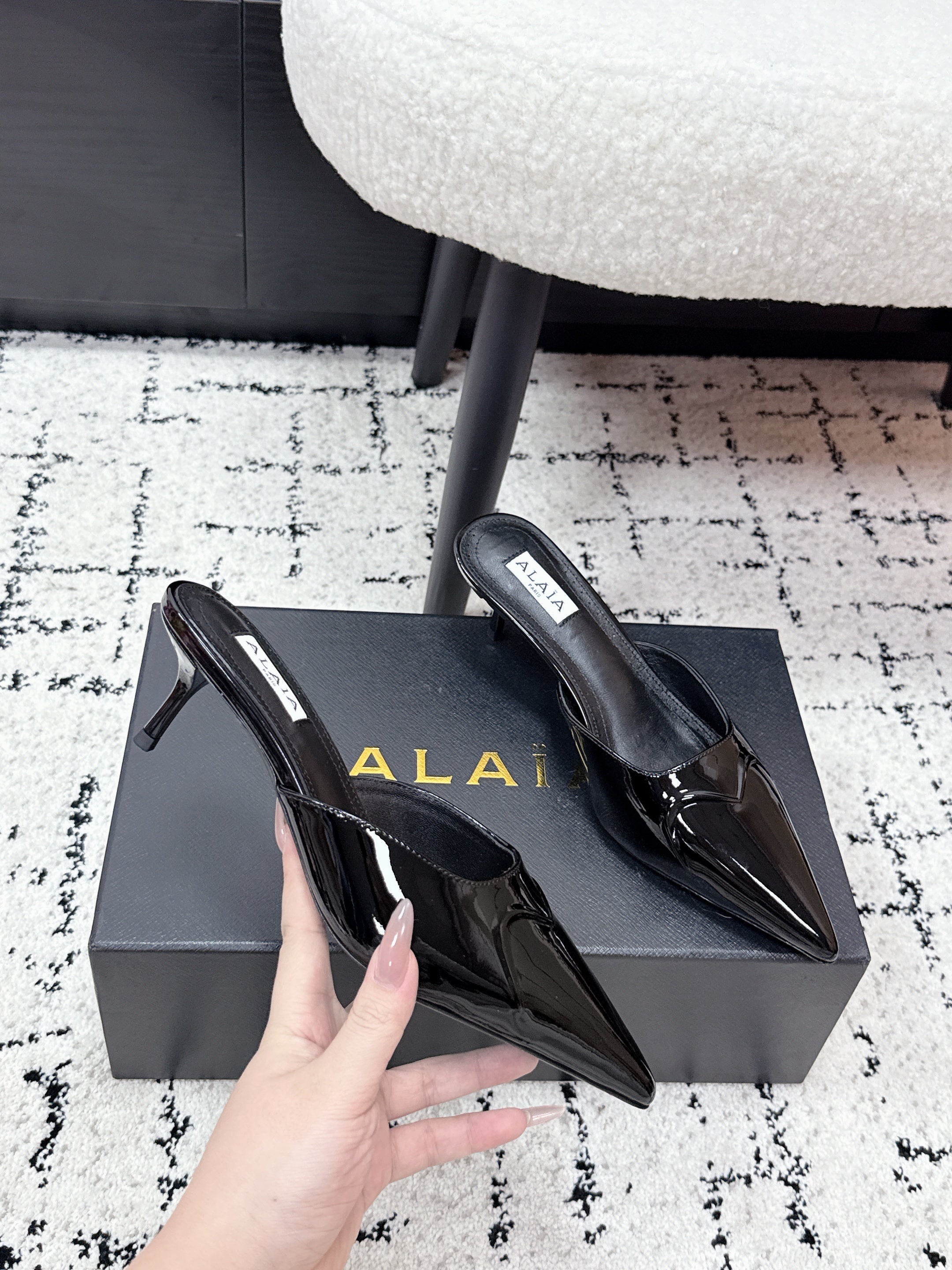 ALAIA 26S HEELED MULES 65 MM IN BLACK GLOSSY CALFSKIN