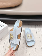 LOEWE 26S FLAT SANDALS IN LIGHT BLUE LOGO GOLD HARDWARE