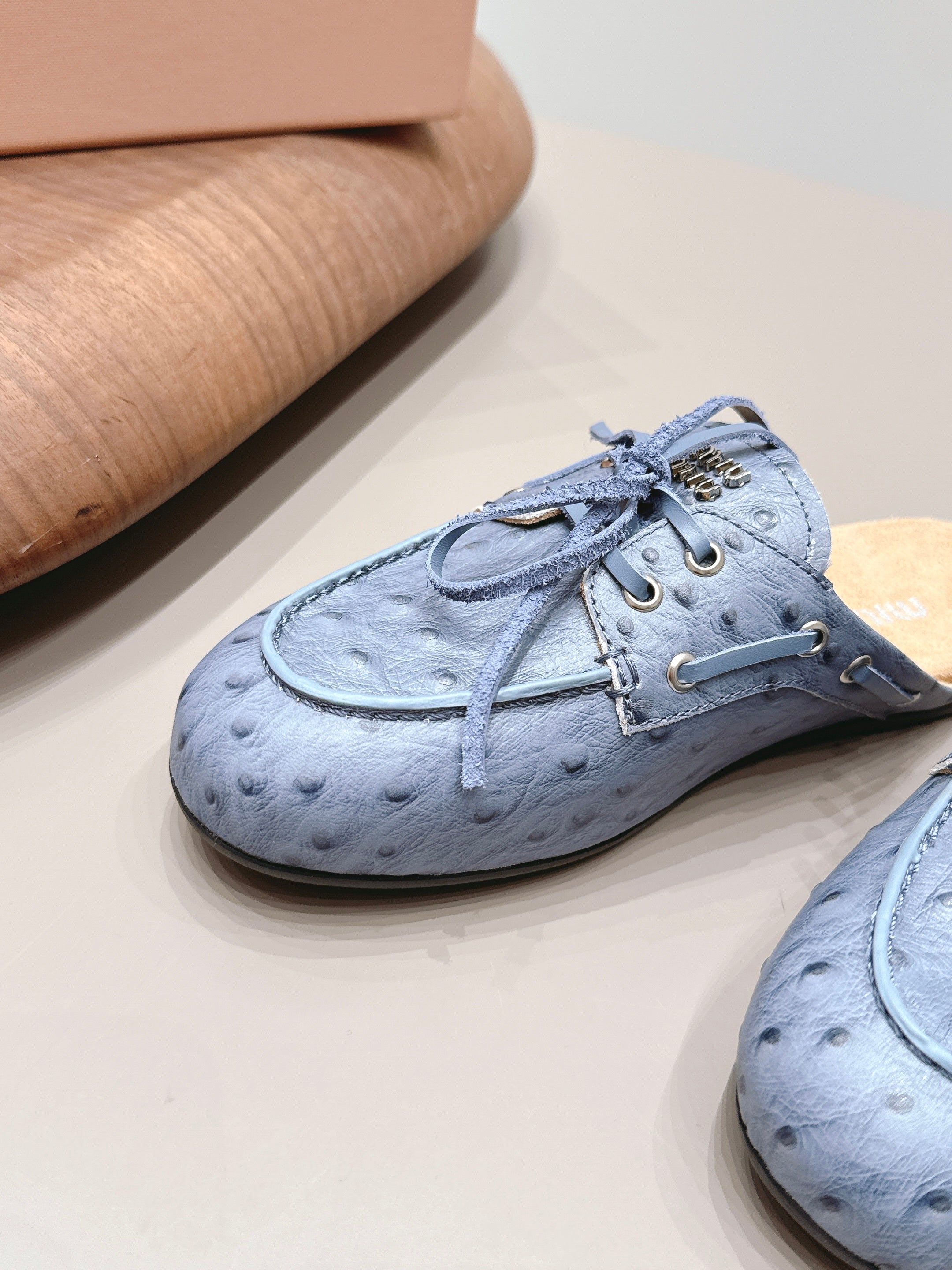 MIUMIU 26S LOAFER MULES IN BLUE CALFSKIN