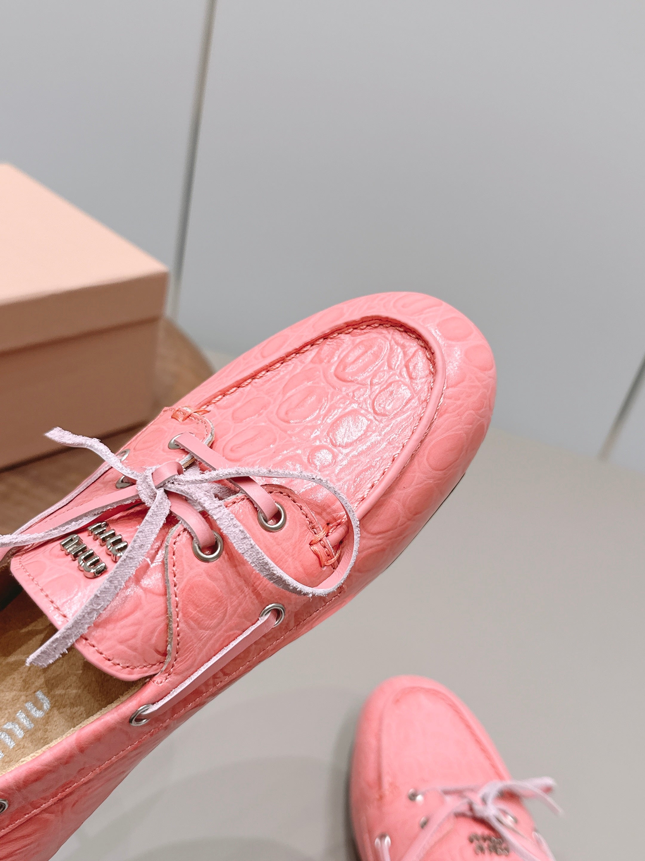MIUMIU 26S BOAT SHOES IN PINK EMBOSSED CALFSKIN