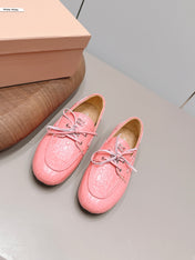 MIUMIU 26S BOAT SHOES IN PINK EMBOSSED CALFSKIN