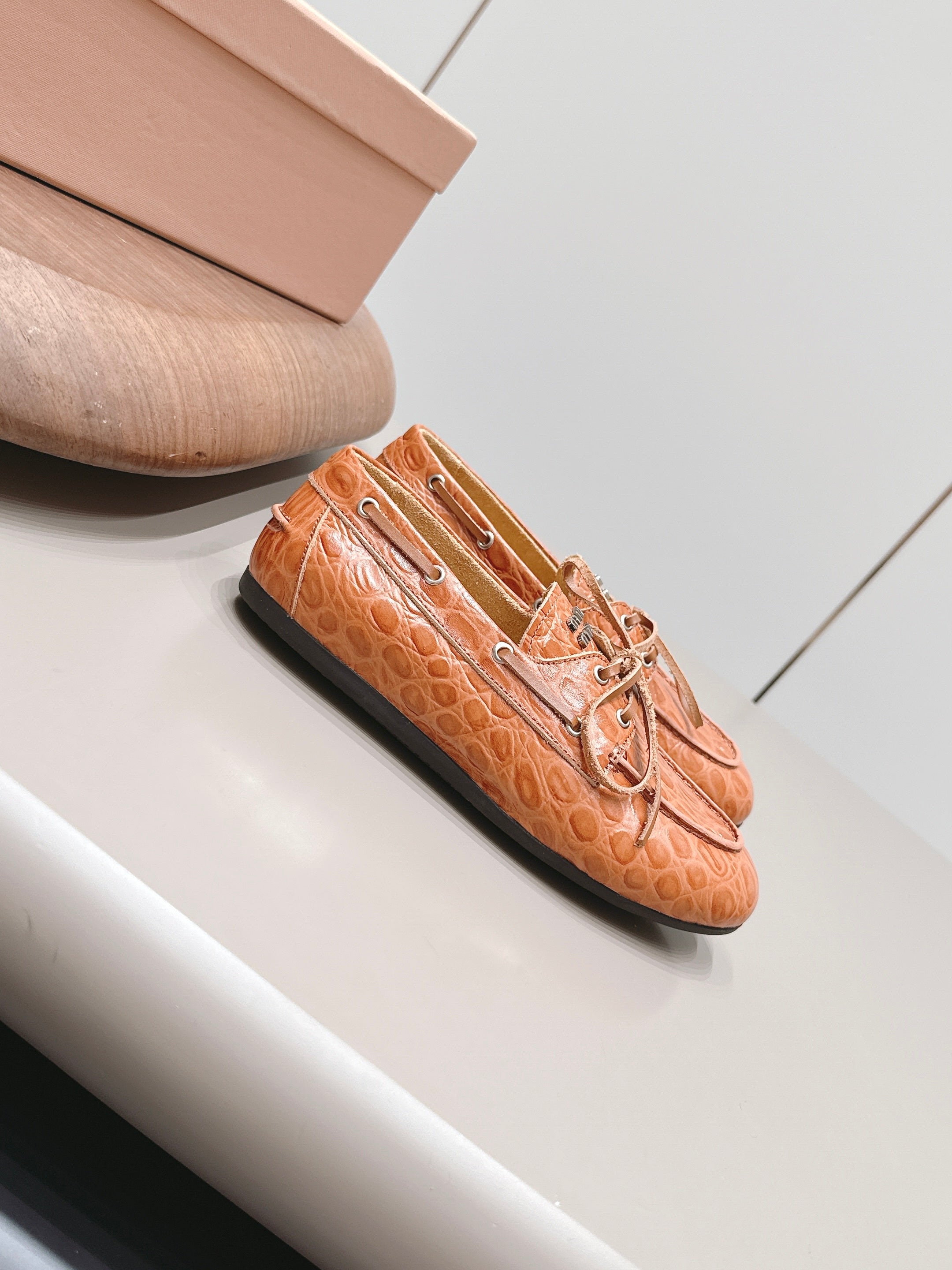 MIUMIU 26S BOAT SHOES IN ORANGE BROWN EMBOSSED CALFSKIN