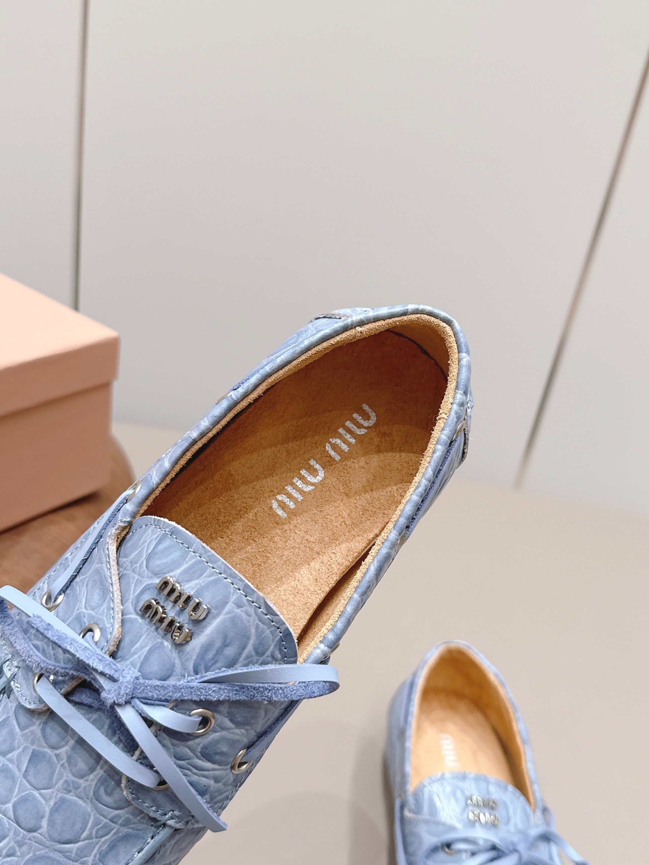 MIUMIU 26S BOAT SHOES IN BLUE EMBOSSED CALFSKIN