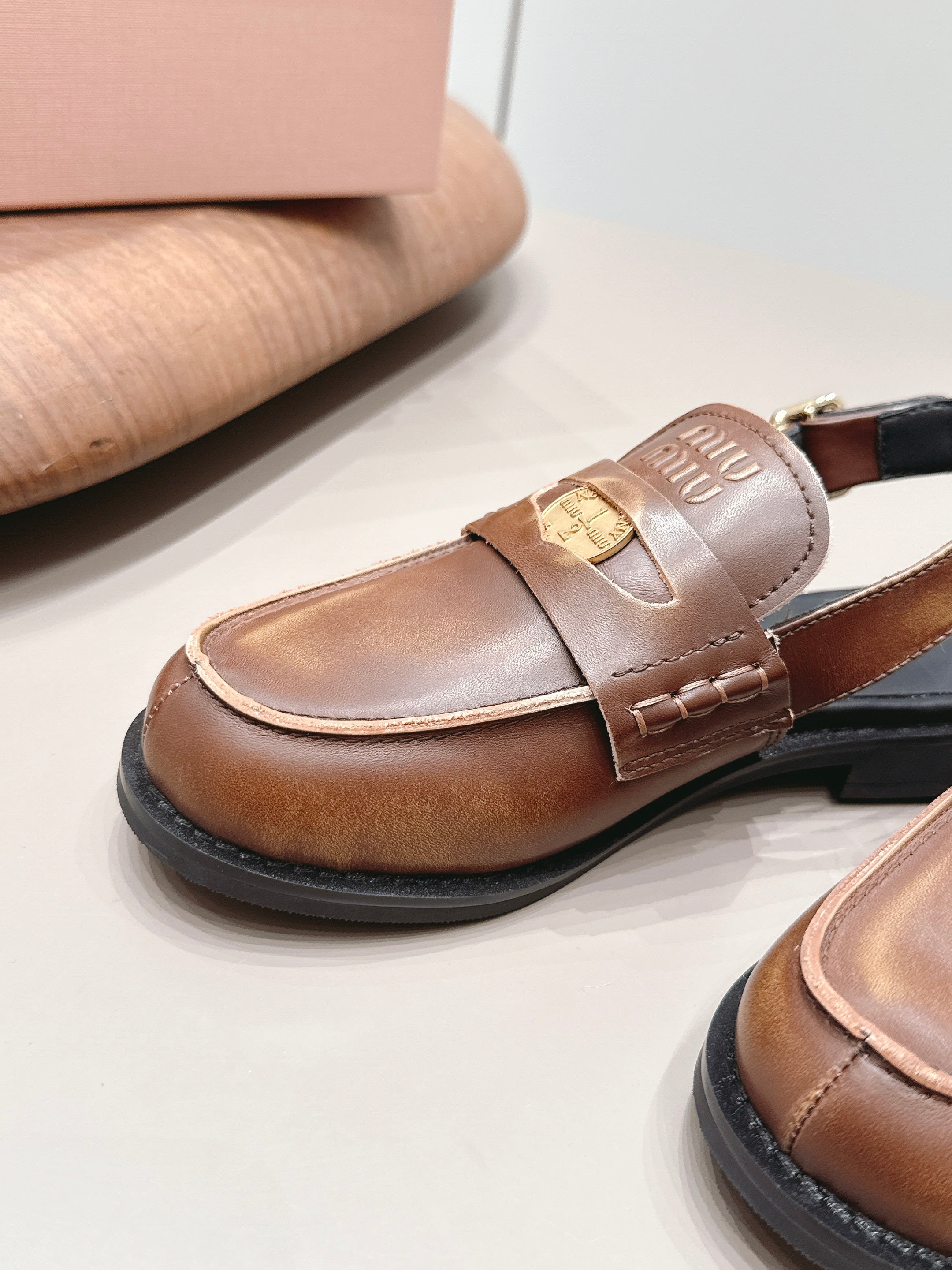 MIUMIU 26S PENNY SLINGBACK LOAFERS IN BROWN CALFSKIN GOLD HARDWARE