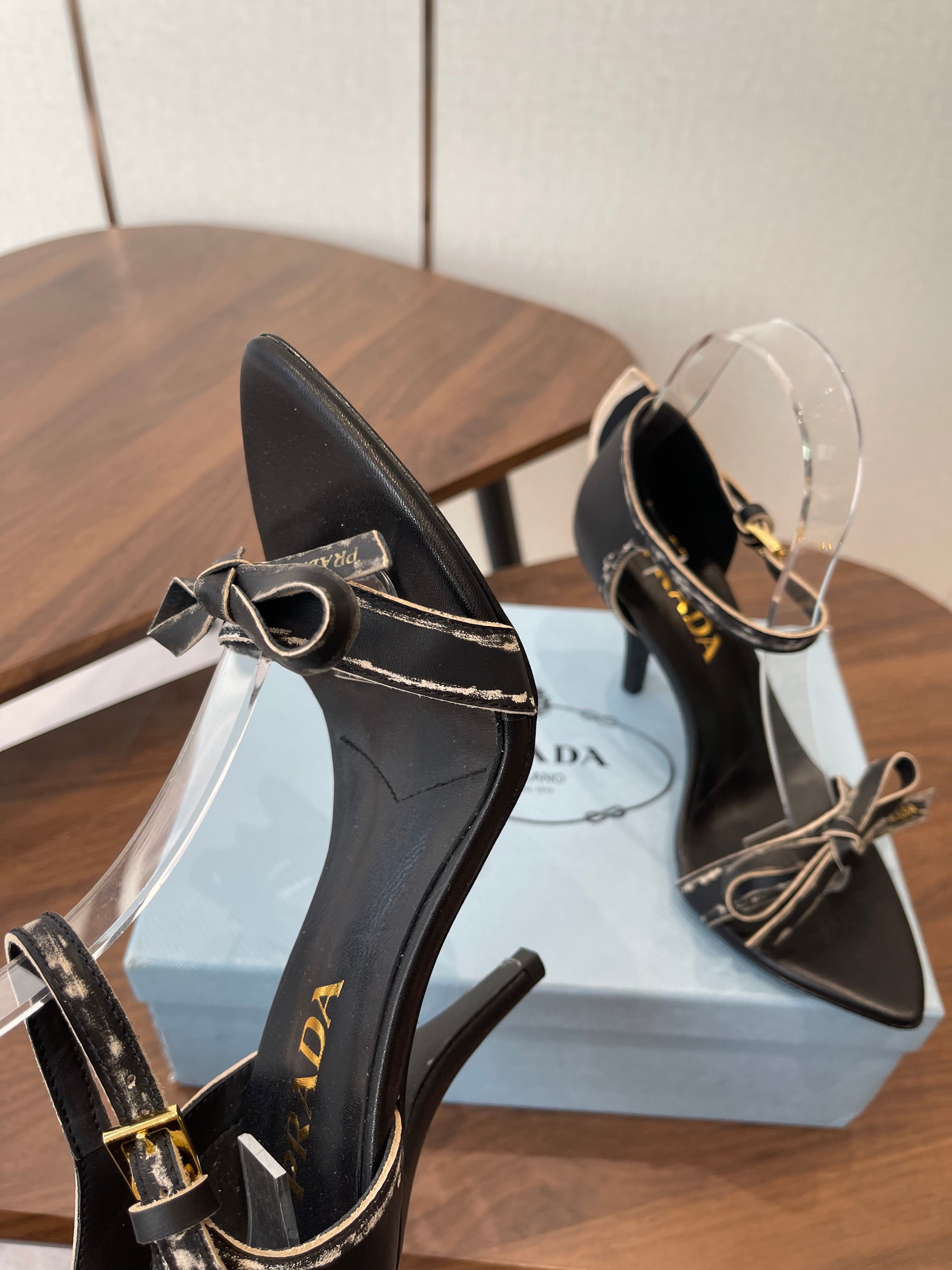PRADA 26S HIGH HEEL SANDALS 85MM IN BLACK CALFSKIN WITH BOW