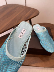 ALAIA 26S FLAT MULES IN BLUE SUEDE AND MESH RHINESTONE-EMBELLISHED