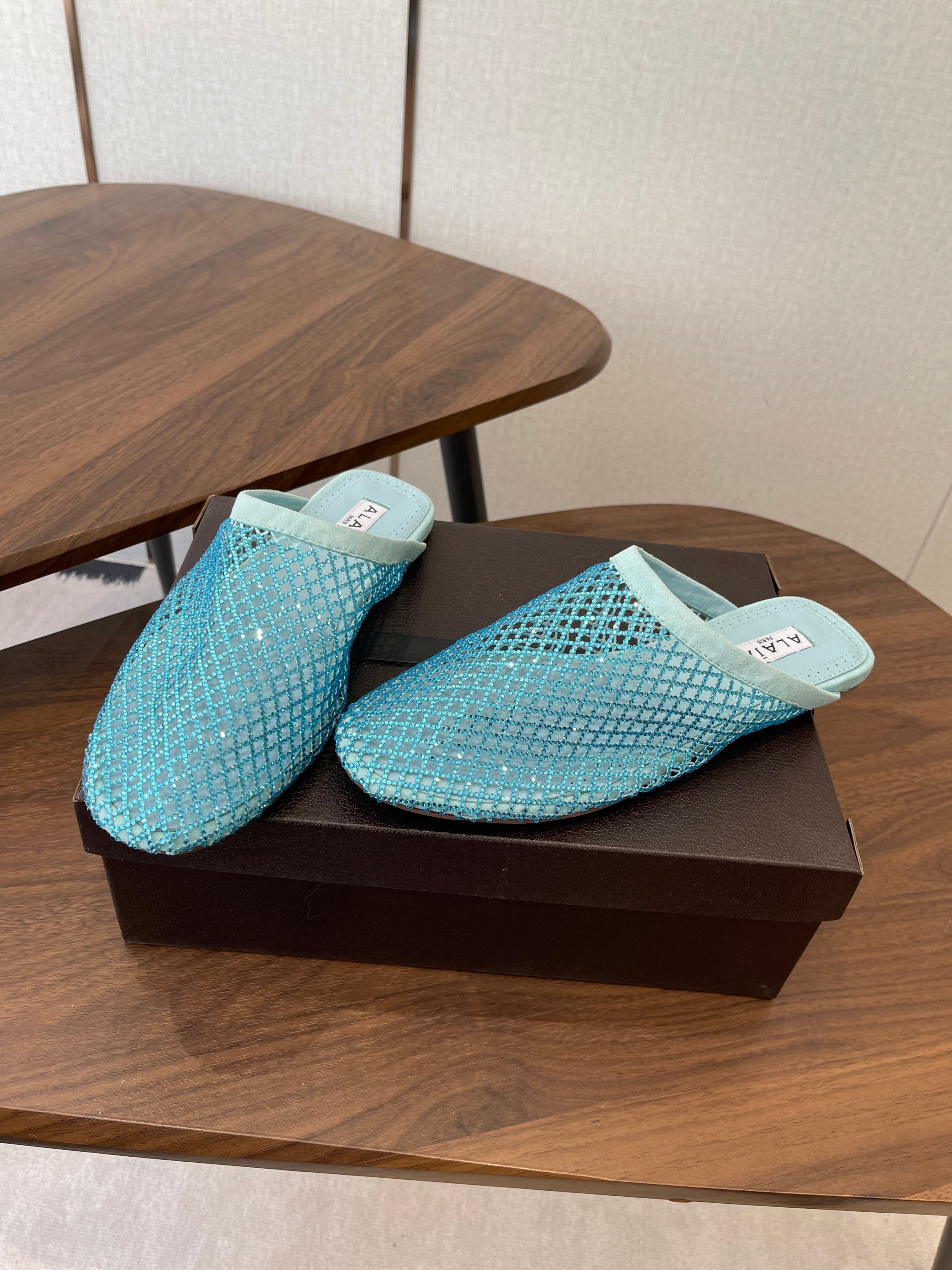 ALAIA 26S FLAT MULES IN BLUE SUEDE AND MESH RHINESTONE-EMBELLISHED