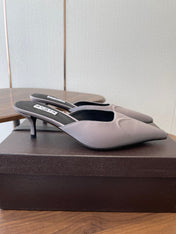 ALAIA 26S HEELED MULES 50 MM IN LAVENDER GREY FABRIC