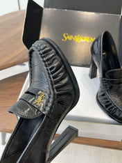 YSL 26S HEELED LOAFERS 100 MM IN BLACK SHINY CALFSKIN