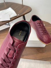 THE ROW 26S SNEAKERS IN BURGUNDY RED CALFSKIN