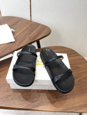 THE ROW 26S DOUBLE STRAP FLAT SANDALS IN BLACK CALFSKIN