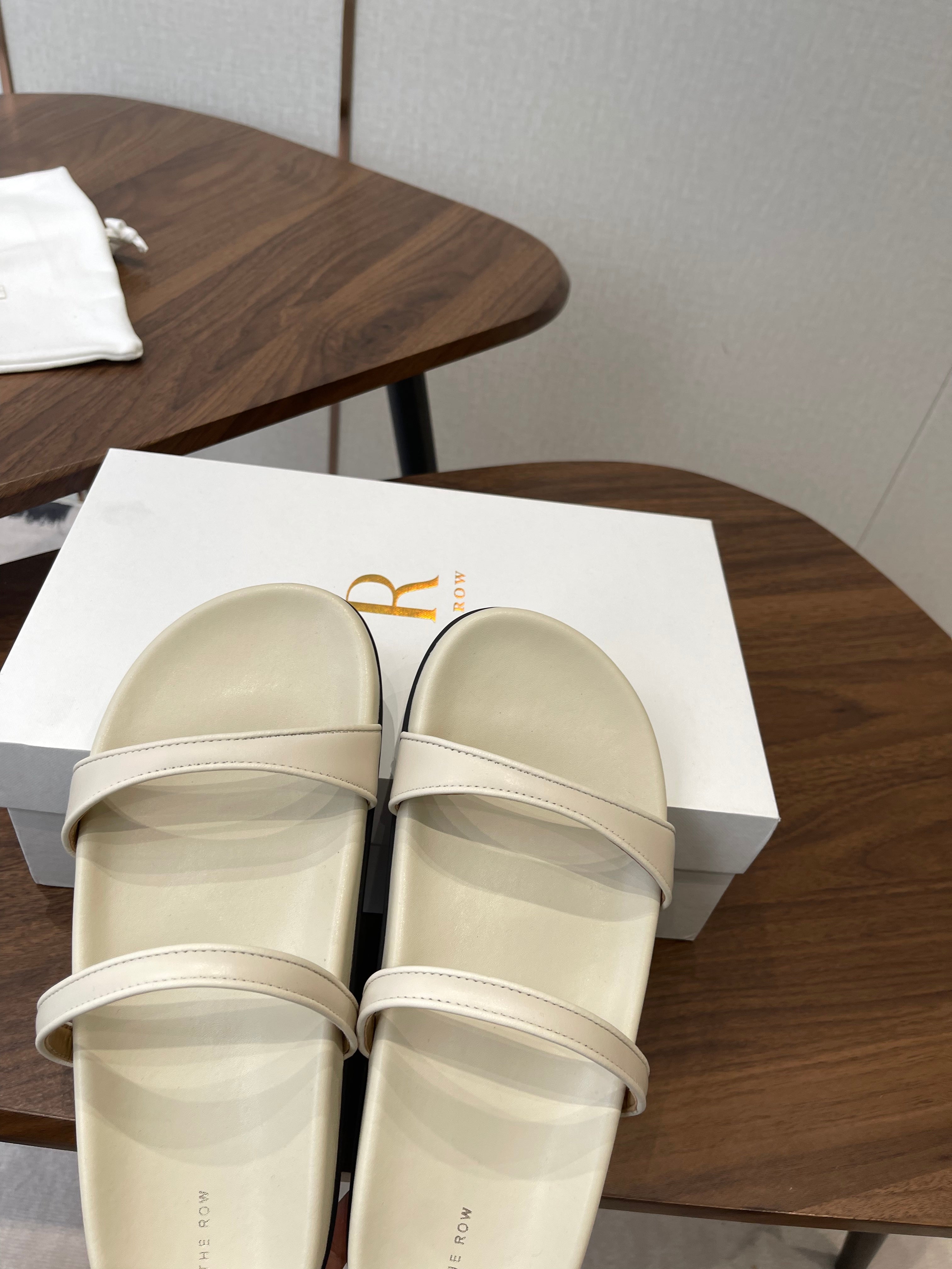 THE ROW 26S DOUBLE STRAP FLAT SANDALS IN IVORY WHITE CALFSKIN