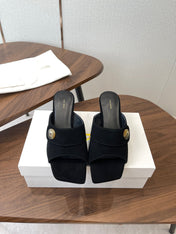 THE ROW 26S BUTTON DETAIL MULE HEELS 70MM IN BLACK SUEDE